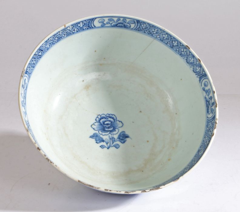 A Chinese blue and white porcelain bowl for export, finely painted with figures, buildings and a - Image 8 of 9