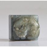Chinese dark green jade tiger, Qing Dynasty, Tung Chih, (1856 - 1875) carved as a curled tiger on