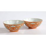 A pair of orange ground Chinese porcelain bowls with Tongzhi (1862-1874) six character red seal