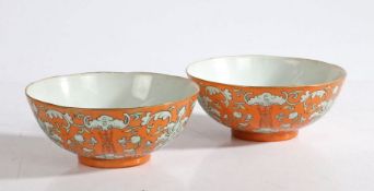 A pair of orange ground Chinese porcelain bowls with Tongzhi (1862-1874) six character red seal