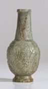 A Chinese jade vase, Qing Dynasty, 18th Century, the grey/green vase carved with a lotus flower