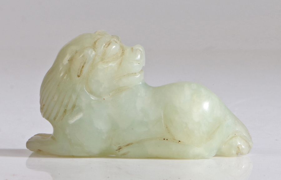 Chinese jade lion, Qing Dynasty, Kuang Hsu, (1875 - 1908) carved as a crouching lion with the head