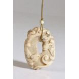 A Chinese 'chicken bone' jade 'chilong' pendant, Song Dynasty (960 AD-1279 AD) with the encircling