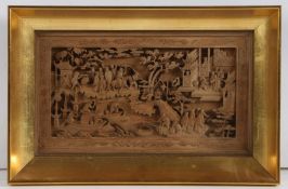 Chinese carved panel, Qing Dynasty, Canton, the figural scene depicting a busy waterway with pagoda,