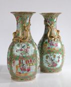 A pair of 19th Century Chinese Canton vases, with colourful panels of figural decoration among C