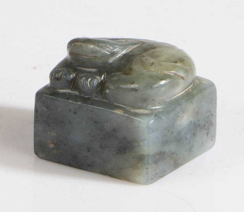 Chinese dark green jade tiger, Qing Dynasty, Tung Chih, (1856 - 1875) carved as a curled tiger on - Image 2 of 2