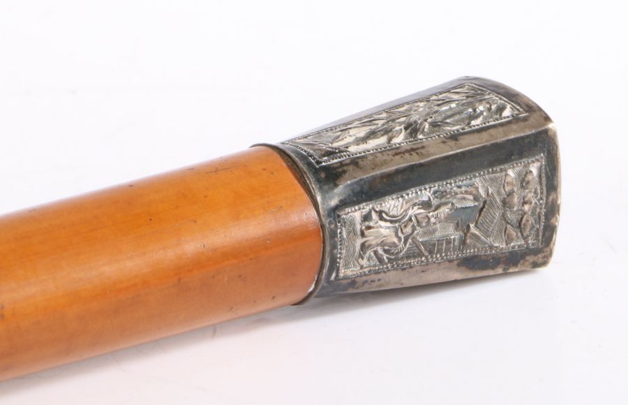 Chinese white metal and malacca walking cane, the silver mount with figural and tree scenes,