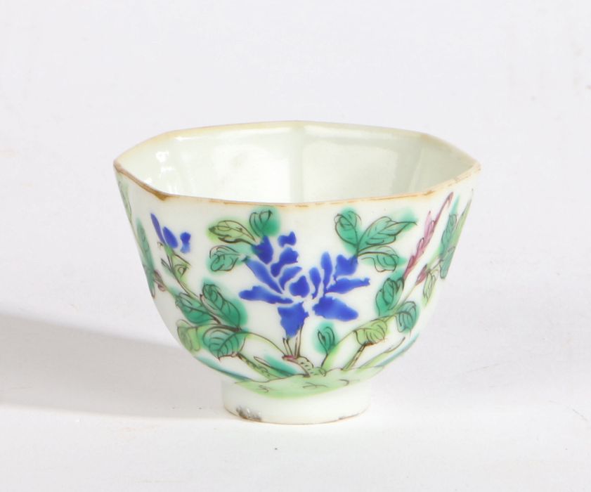 A Chinese porcelain octagonal cup painted with blue chrysanthemums and a verse, early 20th century.