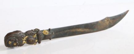 A Japanese bronze page turner, Meiji period (1868-1912). The handle ornately decorated with