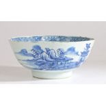 A Chinese blue and white porcelain bowl for export, finely painted with figures, buildings and a