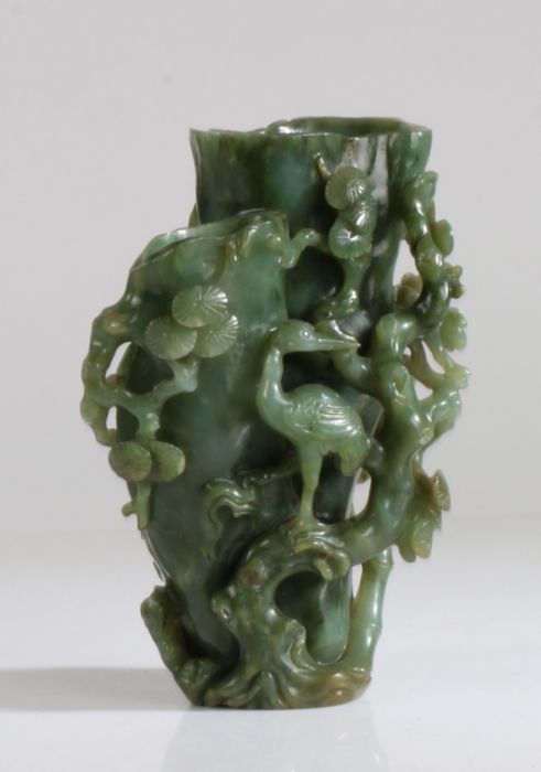 A Chinese spinach jade tree trunk double vase, Qing Dynasty, 18th Century, carved naturalistically