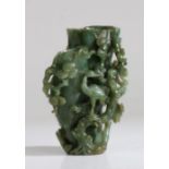 A Chinese spinach jade tree trunk double vase, Qing Dynasty, 18th Century, carved naturalistically