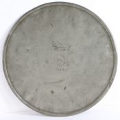 A good early 19th century pewter scale plate, circa 1830-40 Of typical circular flat form, with