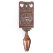 A rare carved fruitwood love spoon, North Wales, circa 1830-40 The large rectangular handle chip-