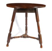 A rare fruitwood and oak round/cricket table, Carmarthenshire, circa 1690-1720 With circular two-