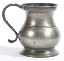 A 19th century pewter Imperial quart bulbous measure, circa 1830-50 Of typical form, stamped ‘