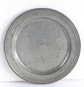 A good Queen Anne pewter multiple-reeded rim and all-over hammered plate, circa 1706 London label