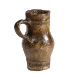 A rare papier mâché jug Realistically modelled as a 15th century stoneware jug, height 15.5cm