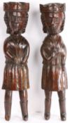 A rare pair of 16th/17th century carved oak figures, a king and queen, English or Welsh, circa