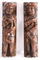 An unusual pair of oak carved figural terms, Flemish, circa 1600 Each designed as a male, with