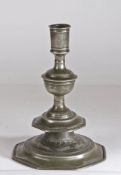 An exceptional and large Charles II pewter octagonal-base and knopped candlestick, circa 1675 Having