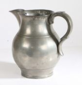 An early 19th century pewter OEAS gallon ale jug, circa 1800-50 Having a bulbous body with single