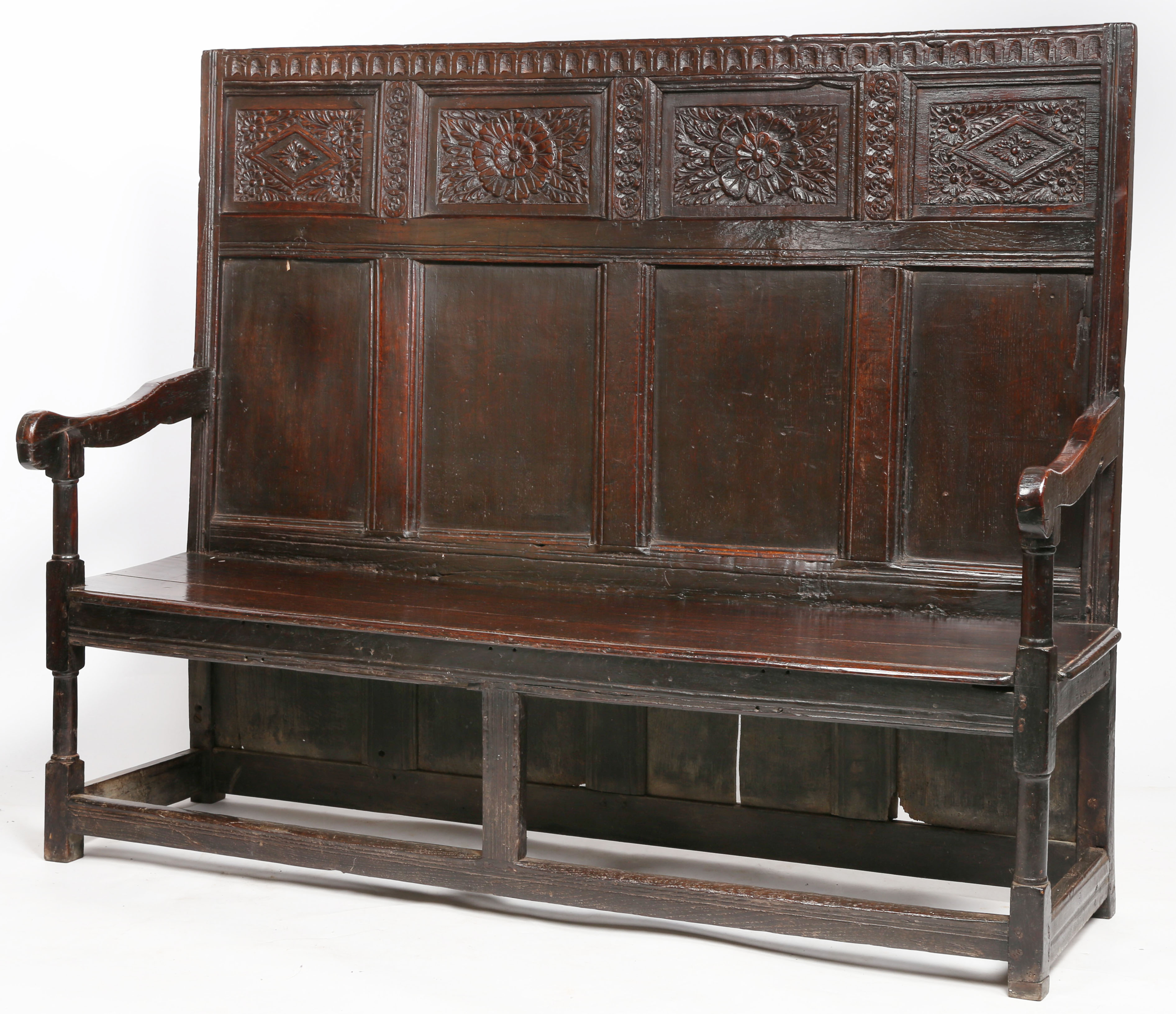 A Charles I oak high-back settle, circa 1640 and later The back with a nulled-carved rail, atop four - Image 2 of 2