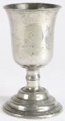 A George III pewter communion cup, circa 1780 Having a deep and wide bowl with flared rim,
