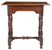 A William & Mary oak centre table, circa 1690 The top of two boards with ovolo-moulded edge,