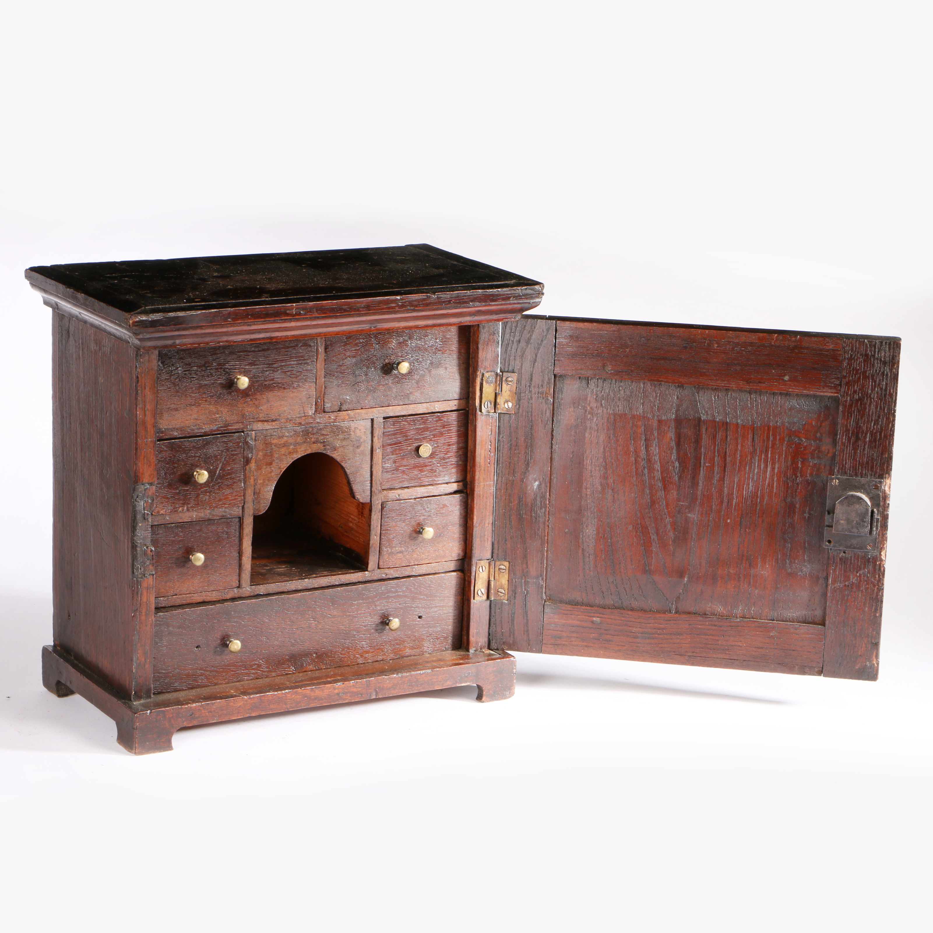 An early 18th century table-top oak spice cupboard, circa 1710-30 Having a fielded panelled cupboard - Image 2 of 2