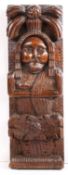 An interesting James I oak figural term, circa 1610 Designed as a male, with beard and moustache,