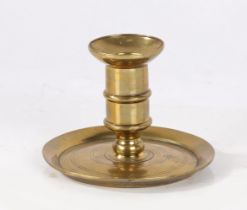 A George I brass lantern candlestick, circa 1720 The straight-sided socket with mid-fillet and