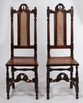 A rare pair of William and Mary yew/cedar and cane high-back side chairs, circa 1690 Each with a