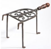 An early to mid-18th century wrought iron bar-grate trivet, with rare maker’s initials, English,