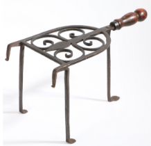 An early to mid-18th century wrought iron bar-grate trivet, with rare maker’s initials, English,