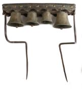 A set of 19th century bronze, iron, timber and leather dray or team bells, English With four