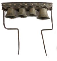 A set of 19th century bronze, iron, timber and leather dray or team bells, English With four