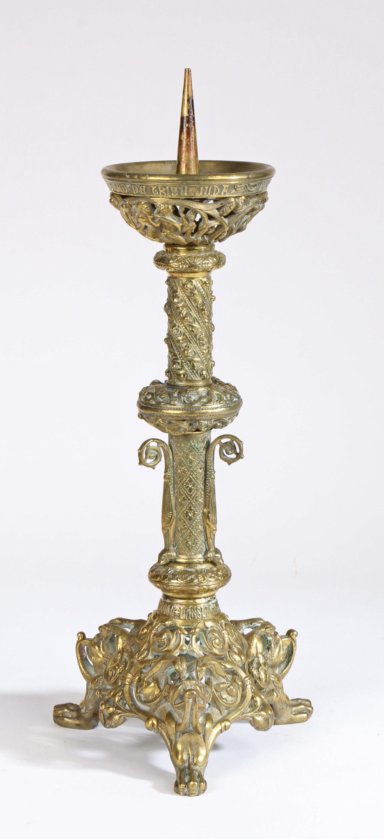 A 19th century Gothic-Revival brass candlestick The pricket top above text and a pierced figural and - Image 2 of 2