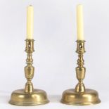 A pair of 18th century brass candlesticks, Spanish Each with a moulded straight-sided socket, a