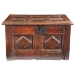 A rare Elizabeth I/James I oak table-chest, West Country, circa 1600-20 Having a six-panelled lid,