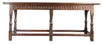 A late 17th century oak six-leg refectory-type table, English, circa 1700 and later Having a one-