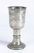 A George II pewter communion cup, circa 1730-40 Having a deep tapering straight-sided bowl with