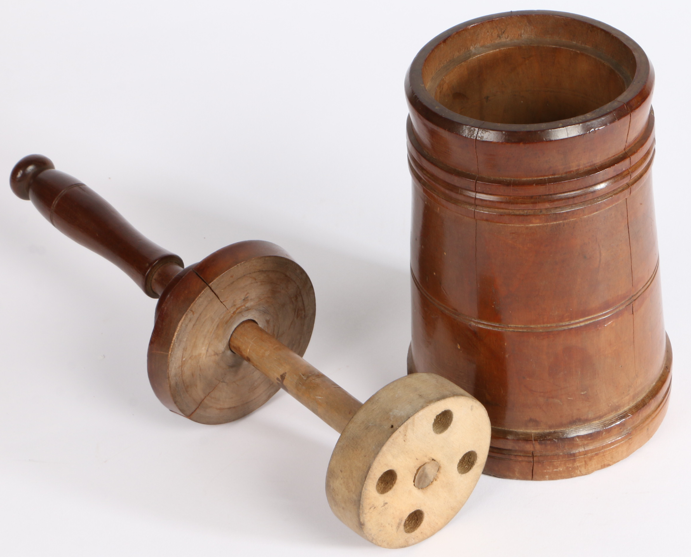 A George III fruitwood hand-held cream/butter churn, circa 1800 Having a tapering drum, with