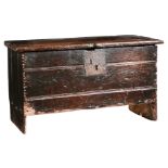 An Elizabeth I/James I boarded oak chest, Welsh, circa 1600-20 The lid, front and side boards all