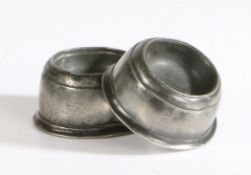A matched pair of William & Mary pewter trencher salts, circa 1700 Each of cylindrical form, with