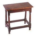 A William and Mary oak joint stool, circa 1690 Having an ovolo-moulded top, plain rails with lower