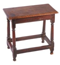 A William and Mary oak joint stool, circa 1690 Having an ovolo-moulded top, plain rails with lower