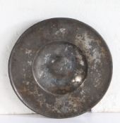 A rare 16th century pewter broad rim saucer, English, circa 1500-50 The rim with raised ‘rolled’
