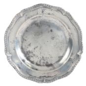 A George II pewter five lobed wavy-edge plate, circa 1745 The rim with a leafy-gadrooned and