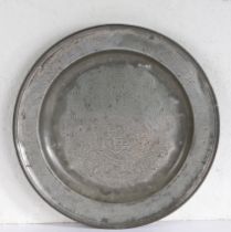 A Charles II pewter single reed and wrigglework decorated dish, Yorkshire, dated 1674 The well